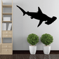 Hammerhead shark swimming decal with black silhouette fins and tail