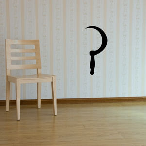 Hand scythe wall decal with black curved blade and handle