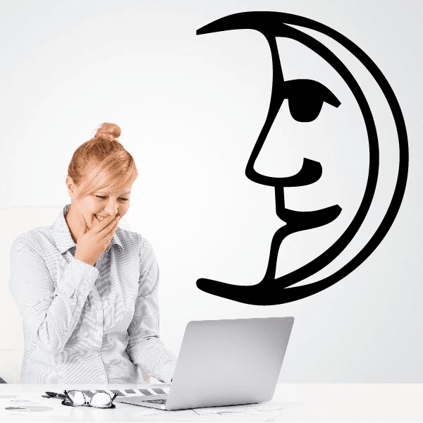 Black crescent moon face wall decal with smiling cartoon features