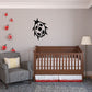 Ladybug wall decal with smiling face and black spots, plus small ladybugs.