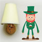 St Patrick's Day leprechaun die-cut decal, green hat and coat, cartoon standing figure