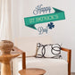 Four-leaf clover St. Patrick's Day sticker with green ribbon banner and blue clover
