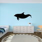 Black dolphin swimming wall decal