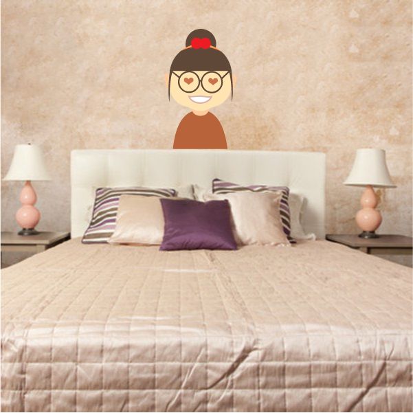 Cartoon heart-eyes woman sticker with red headband above bed pillows