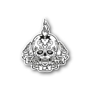 Skull candle vinyl sticker with flame, ornate face and Hasta la Muerte text.