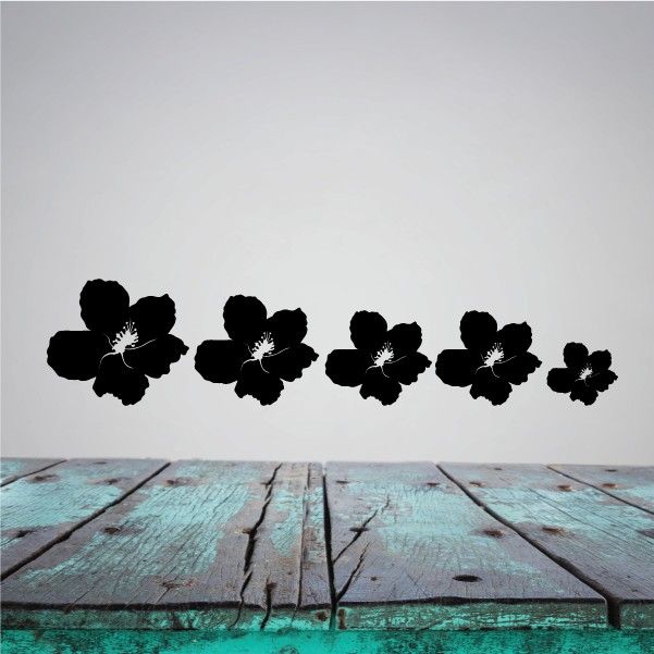 Hawaiian flower family decal set with black hibiscus-style silhouettes
