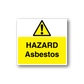 Asbestos hazard sticker with yellow warning triangle and 'HAZARD Asbestos' text