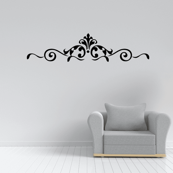 Vinyl wall decal ornament with black scrollwork and a fleur-de-lis centerpiece