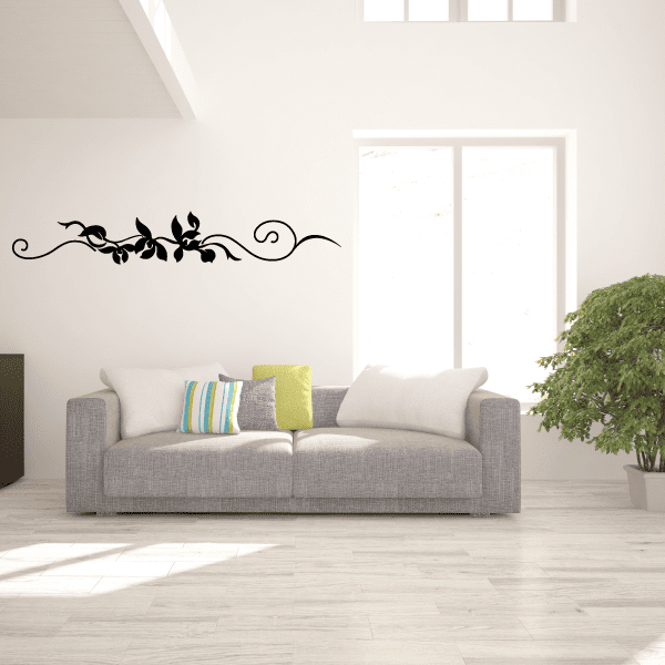 Black ornamental vine wall decal with swirling leaves and flourishes
