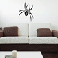 Heart spider wall decal with black eight-legged design and small heart accents