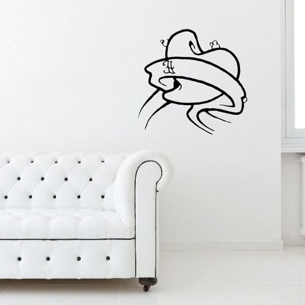 Vinyl wall decal of angel wings and ribbon with heart and cross outline