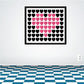 Square wall decal with collage of black and pink hearts in a grid