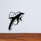 Black dolphin wall decal with heart and moon accents