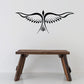 Black eagle wing decal with central beak and raised feather detail