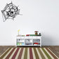 Black spider web wall decal with intersecting web strands and central spider shape.