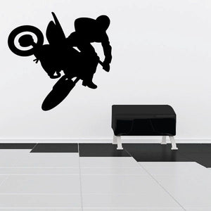 Black dirt bike clicker decal with rider silhouette and circular emblem