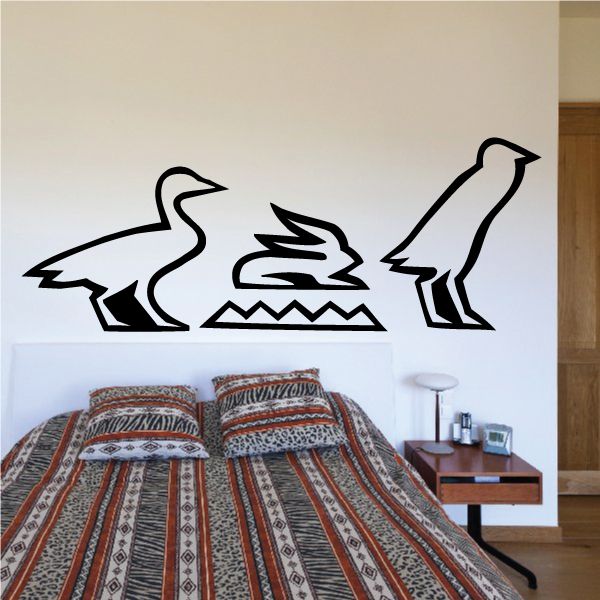 Egyptian hieroglyph wall decal with bold black bird and staff symbols