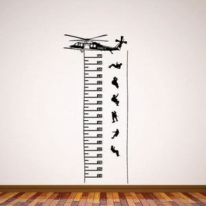 Helicopter-themed growth chart wall decal with ruler scale and figure silhouettes