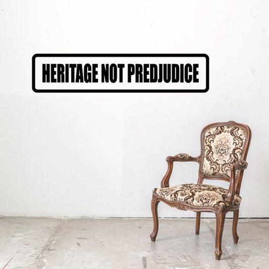 Black rectangular decal with white text HERITAGE NOT PREJUDICE.