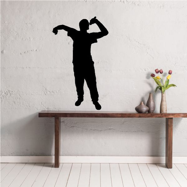 Hip hop dancer wall decal in black vinyl, silhouette of dancer with arms raised