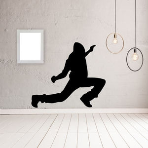 Hip hop dancer wall decal, black vinyl silhouette of dancing figure mid-kick