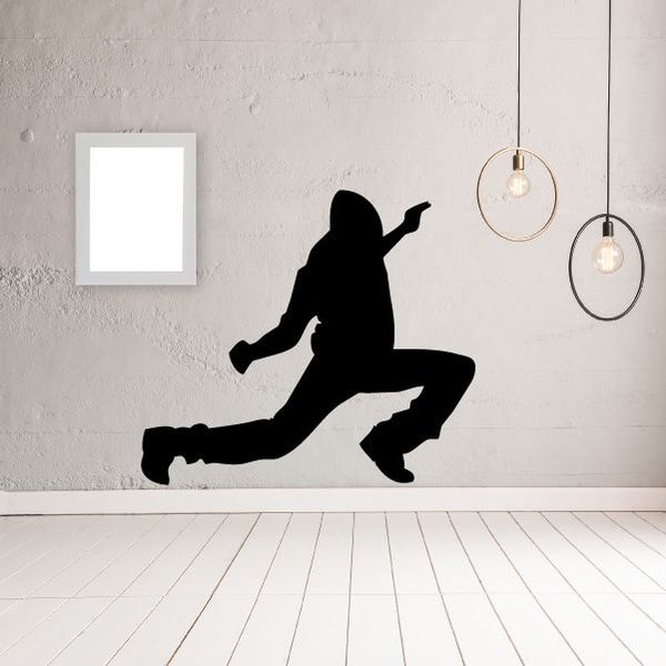 Hip hop dancer wall decal, black vinyl silhouette of dancing figure mid-kick