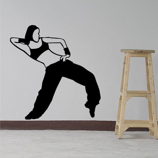 Hip hop dancer wall decal, black vinyl silhouette of rapper in pose.