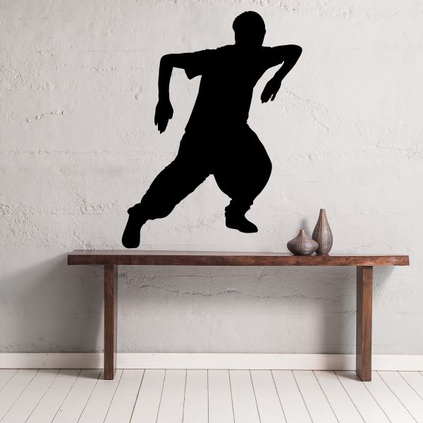 Black hip hop dancer wall decal vinyl silhouette, mid-dance pose