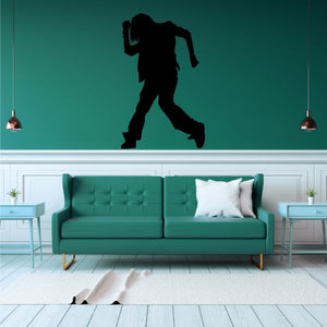 Black hip hop dancer vinyl wall decal silhouette in mid-step pose
