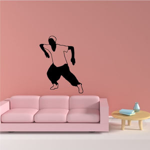 Hip hop dancer wall decal with black dancer silhouette, arms raised and mid-step.