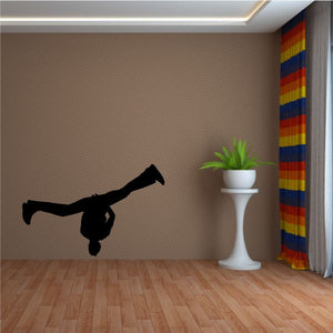 Black hip hop dancer vinyl wall decal in mid-pose, mounted on wall