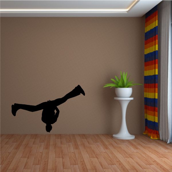 Black hip hop dancer vinyl wall decal in mid-pose, mounted on wall