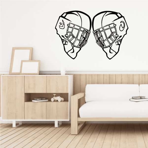 Hockey goalie helmet wall decal with two white outlined goalie masks and cages