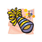 Colorful party hat sticker with confetti dots