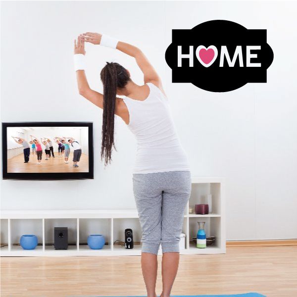 Black HOME wall decal with red heart in lettering