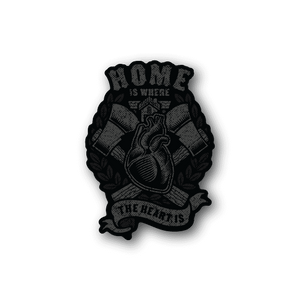 Vinyl wall sticker with heart and 'Home is where the heart is' text