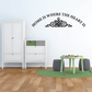 Wall decal in black cursive: 'HOME IS WHERE THE HEART IS' with heart flourish