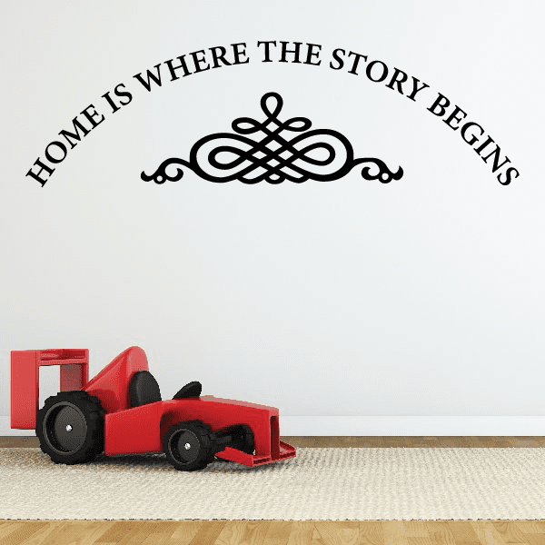 Wall decal: "Home is where the story begins" with decorative knot icon