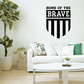 Vinyl wall decal with shield emblem and bold text 'HOME OF THE BRAVE'