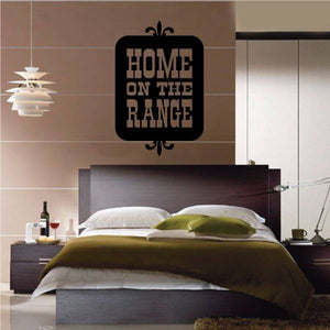 Black square wall decal with "HOME ON THE RANGE" text and decorative corner swirls