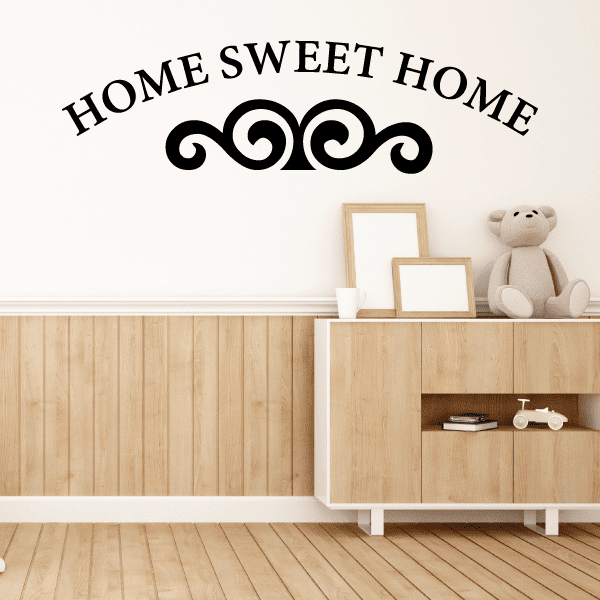 Home Sweet Home wall decal with arched lettering and black swirl flourishes