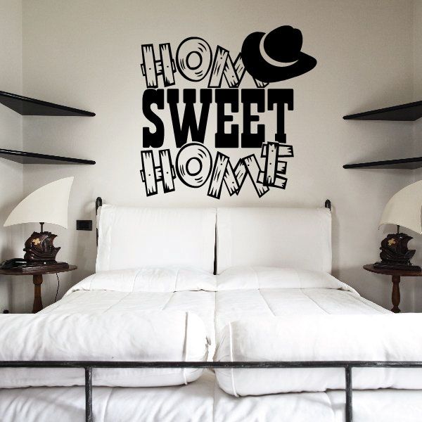 Black vinyl wall decal with "Home Sweet Home" quote text