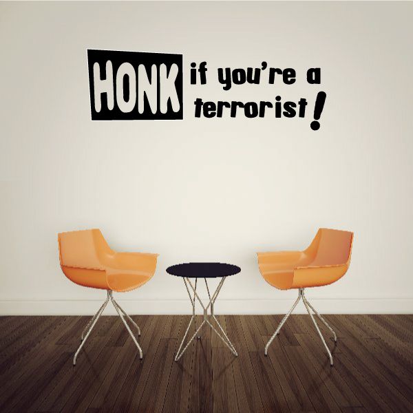 Black vinyl decal with white text: “HONK if you’re a terrorist!”