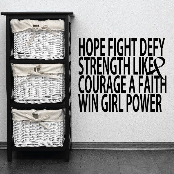 Motivational quote wall decal with bold black text: HOPE FIGHT DEFY STRENGTH…