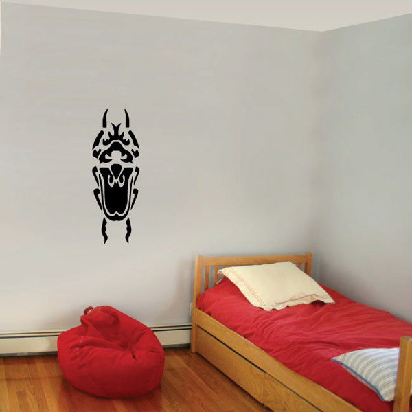 Black horned tribal vertical decal with skull-like face design