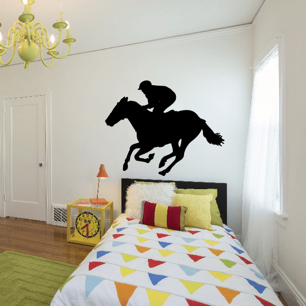 Horse racing wall decal: black jockey on galloping horse silhouette.