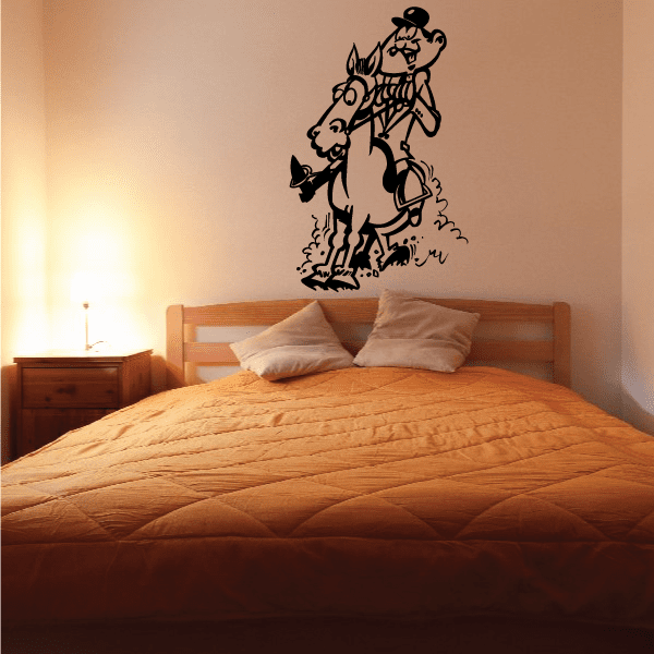 Horseback riding vinyl wall decal with rider on horse silhouette