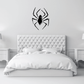 Black spider decal with web pattern