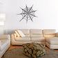 Spider web wall decal with black eight-spoke web and center spider