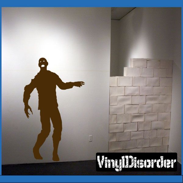Howling zombie wall decal, dark brown silhouette with open mouth and outstretched arms